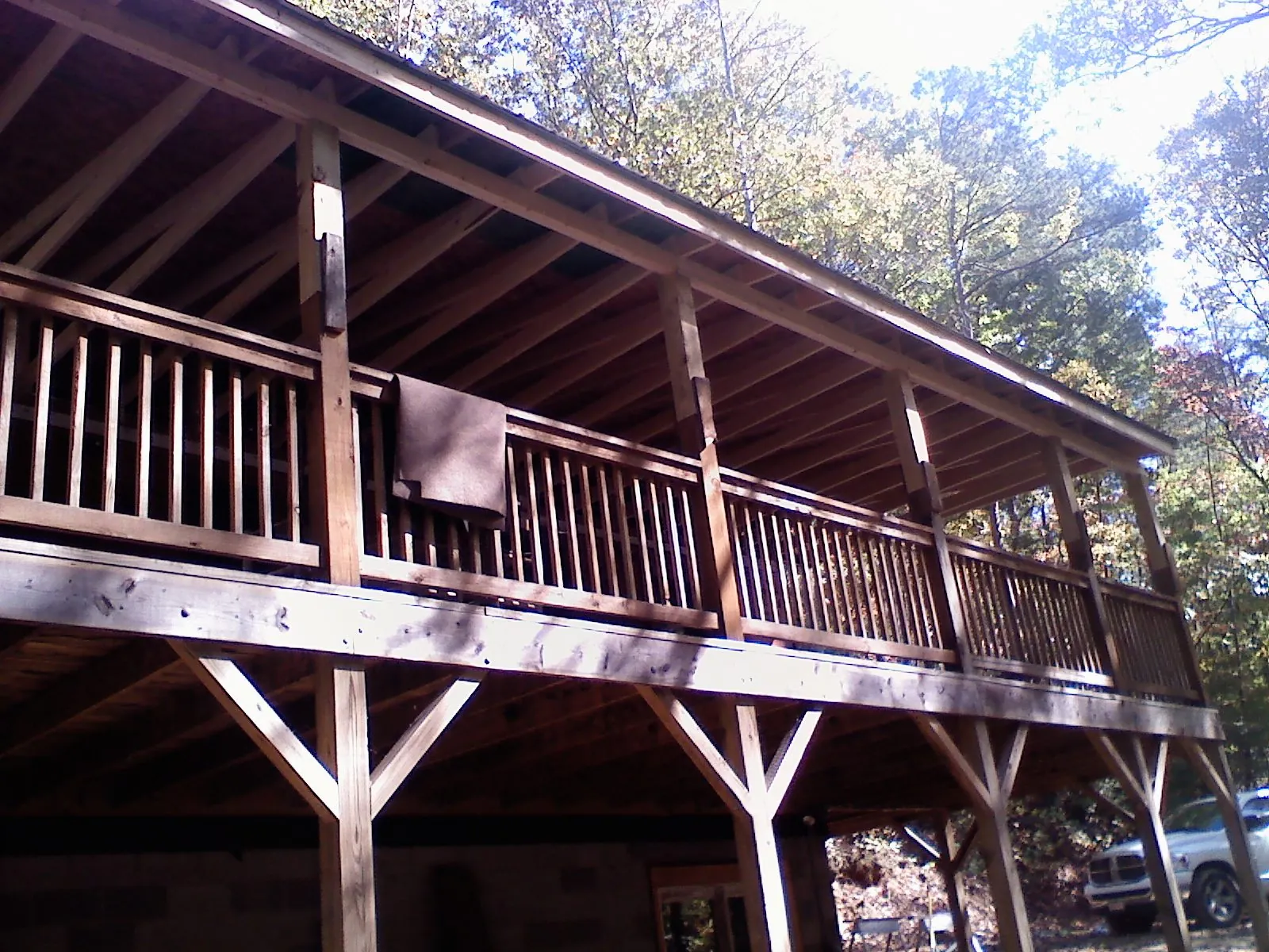 Timber framing under a new elevated porch and deck — Roof Leak Repair in Monee by Roofing Brothers